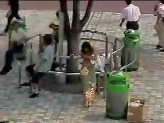 Changing in the street - Japanese mistress in public part one