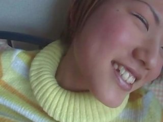 Little jap girl squeezing her tits while getting cunt finger fucked