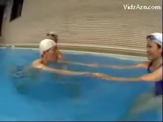 Slim buddy In Swimming Cap Getting Kiss Of Life manhood Jerked By 3 Girls Licking Pussies Nearby The Swimming Pool